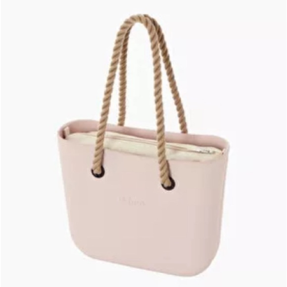 O bag Italian rubber bag. 2 different inserts, rope handles. New. coral color